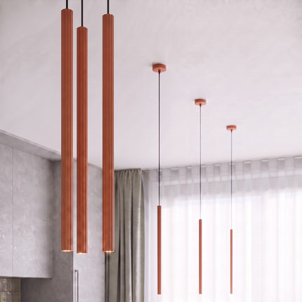 Suspension Cannelée 1 Lumière acier ocre rouge dans un intérieur contemporain
