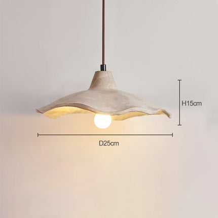 Suspension circulaire en béton diffusant une lumière homogène et enveloppante