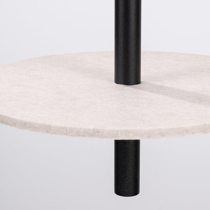 suspension disque de feutre beige et tube fin noir 30 cm, vue sur fond coloré