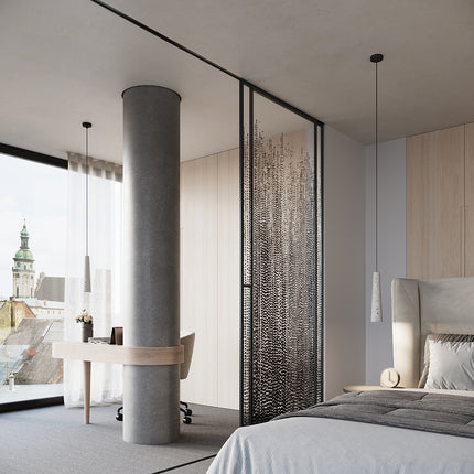 Suspensions Electra grise et noire dans une chambre moderne, près d'un bureau et d'un lit