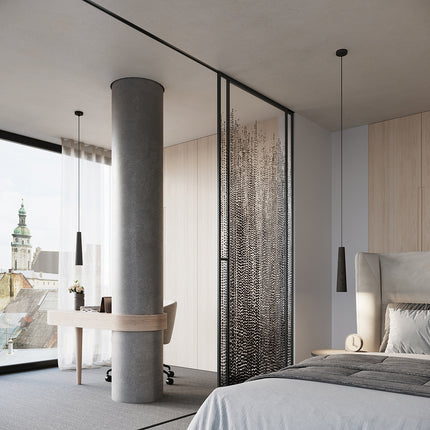 Suspensions Electra grise et noire dans une chambre moderne, près d'un bureau et d'un lit