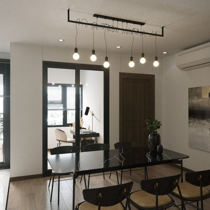 Suspension Entrelacs noire au-dessus d'une table en marbre dans une salle a manger