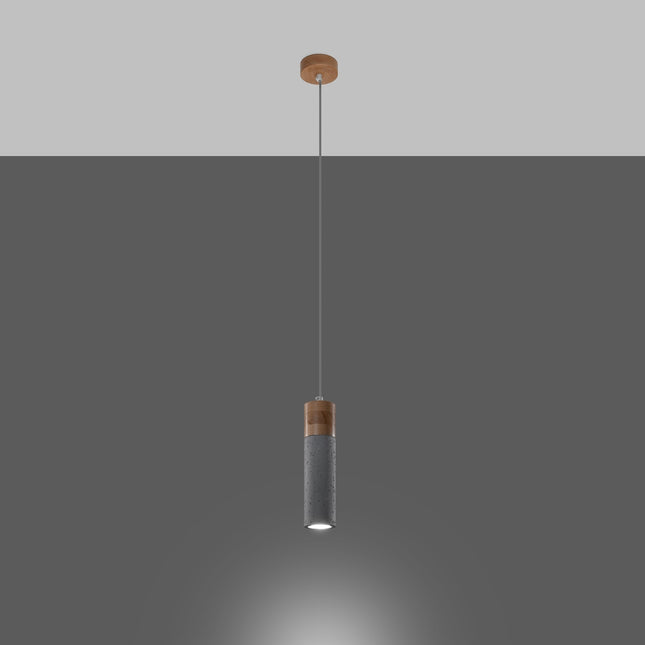 Gros plan sur le tube en béton brut et l'embase en bois clair de la suspension Fusion Minimaliste 1 spot.