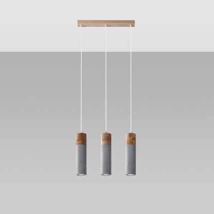 Suspension Fusion Minimaliste 3 spots sur platine rectangulaire, trois tubes en béton et bois clair alignés.