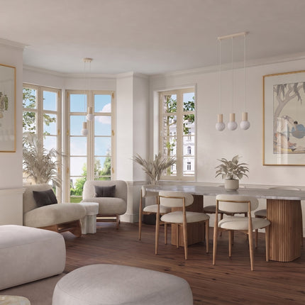 Suspension Halo 2 globes sur barre beige au-dessus d'un îlot de cuisine