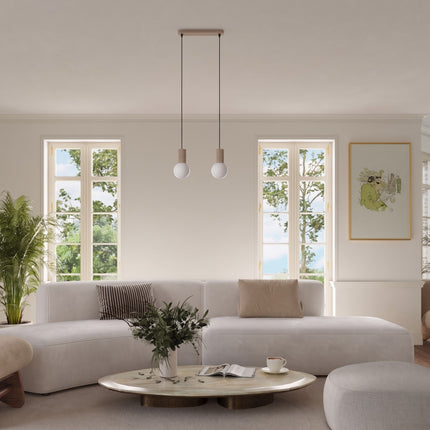 Suspension Halo 2 globes sur barre taupe au-dessus d'une table à manger
