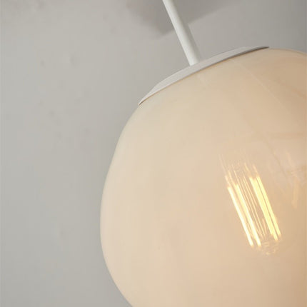 Suspension Helsinki en verre soufflé blanc laité, diffuseur galet, câble textile et base métal blanc