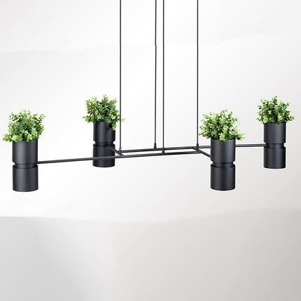 Suspension jardinière lumineuse noire à 4 spots GU10 avec petites plantes vertes, sur fond clair