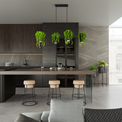 Suspension jardinière lumineuse noire au-dessus d'un îlot de cuisine moderne avec tabourets