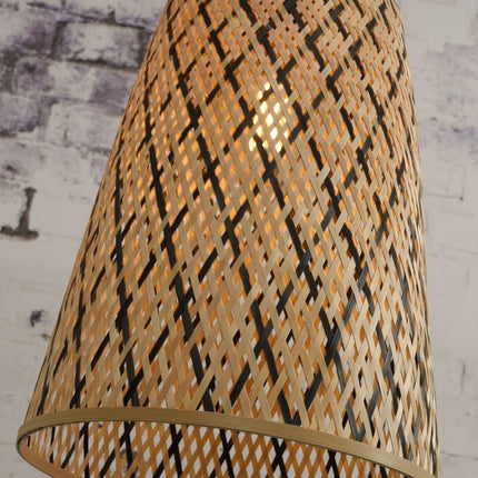 Detail of the natural and black bamboo lattice weave letting the warm light of the Kalimantan pendant light filter through