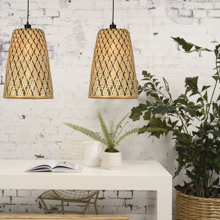Two conical woven bamboo Kalimantan pendant lights hanging above a console in a chic bohemian interior