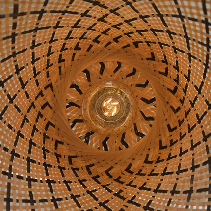 View from below of the Kalimantan pendant light showing the spiral bamboo weave around the lit bulb