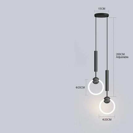 Suspension LED à anneaux nordique au-dessus d'un bureau