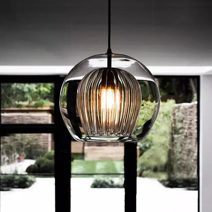 Suspension LED double verre nordique suspendue dans un salon