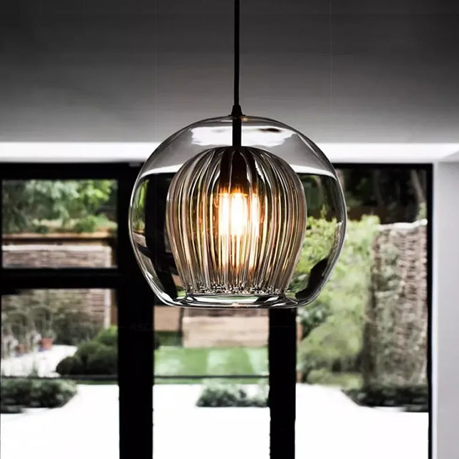 Suspension LED double verre nordique suspendue dans un salon