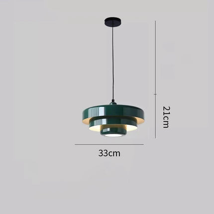 Suspension LED minimaliste de couleur vert foncé, apportant une touche de modernité et de couleur à l'intérieur.