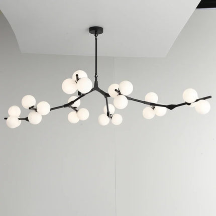 Suspension LED nordique branches d'arbre allumée diffusant une lumière douce