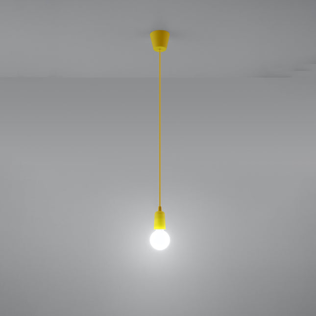 Suspension Ligne Pure jaune allumée, lumière douce sur mur clair