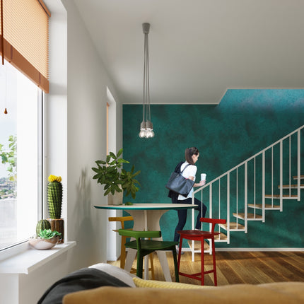 Suspension Ligne Pure grise 3 lampes au-dessus d'une table à manger