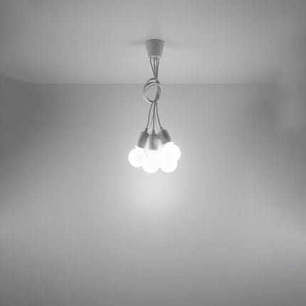 Détail des câbles fins et de la rosace de plafond blanche de la suspension Ligne Pure