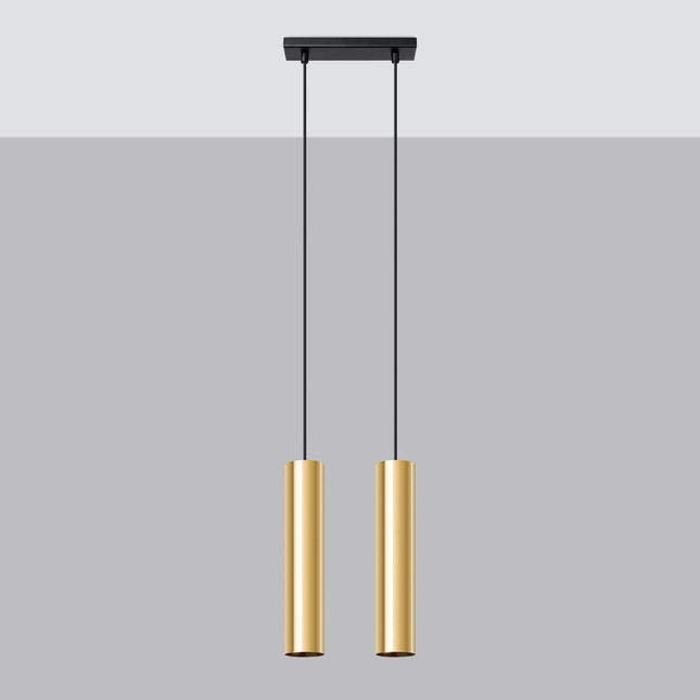 Suspension Long Cylindre 2 Or Poli, deux abat-jour cylindriques en acier doré au-dessus d'une table à manger
