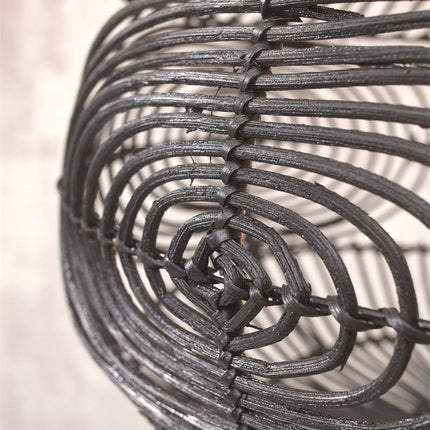 Close-up of the handcrafted black rattan weave of the Madeira pendant light, detailed circular pattern