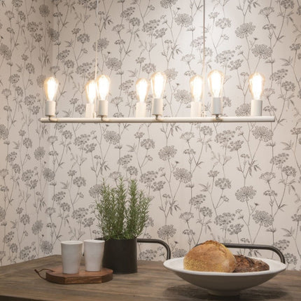 Suspension Miami blanche allumée, huit ampoules à filament au-dessus d'une table