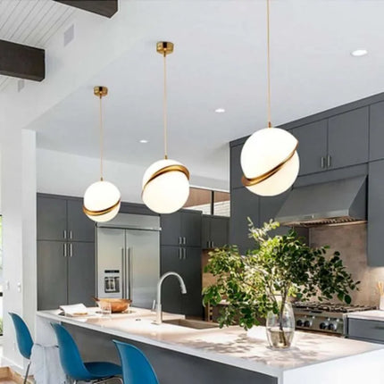 Suspension nordique double demi-sphère LED au-dessus d'une table à manger