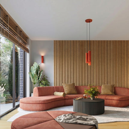 Suspension Oslo 3 cylindres en cascade rouge vif dans une pièce à vivre