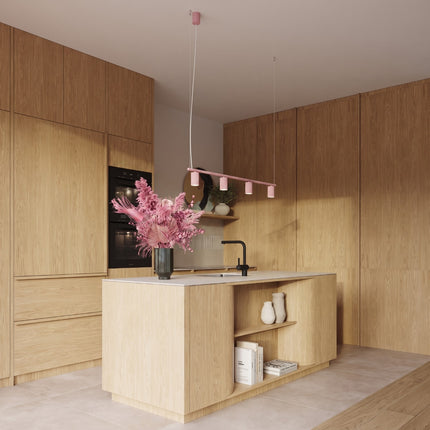 Suspension Oslo poutre 4 cylindres 122 cm rose poudré au-dessus d'un plan de travail