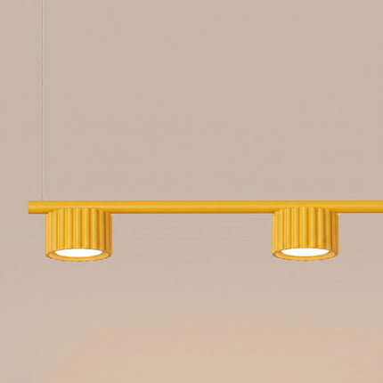 Suspension poutre 4 spots Aura jaune ambré, packshot de trois quarts