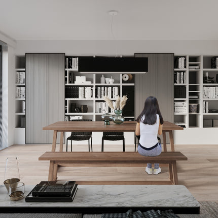 Suspension rectangulaire tissu noir au-dessus d'une table en bois dans une salle a manger
