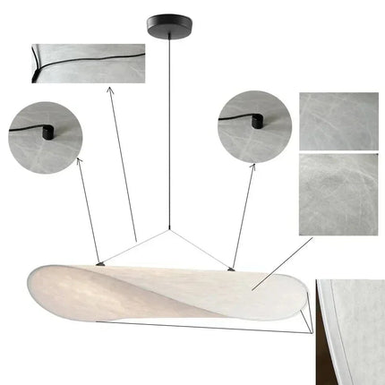 Détails de la suspension en soie : câbles, rosace et texture du voile