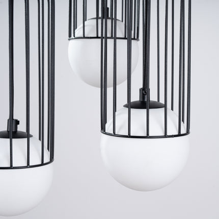 Détail de la douille G9 à l'intérieur d'une cage de la suspension Sphère en Cage groupée