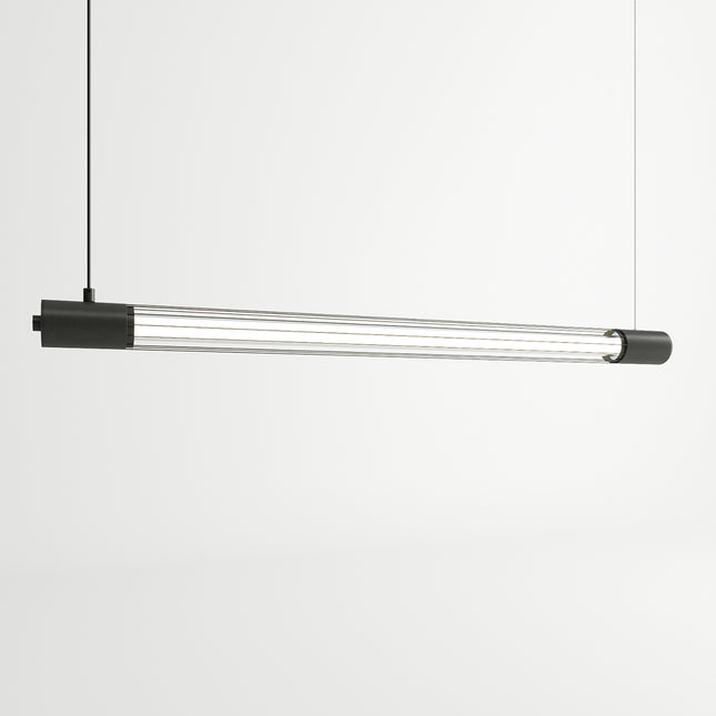 Suspension tube lumineux noir de style industriel au-dessus d'une table dans un loft en briques