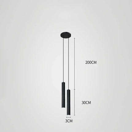Suspension tube nordique noire en lampe de chevet dans une chambre