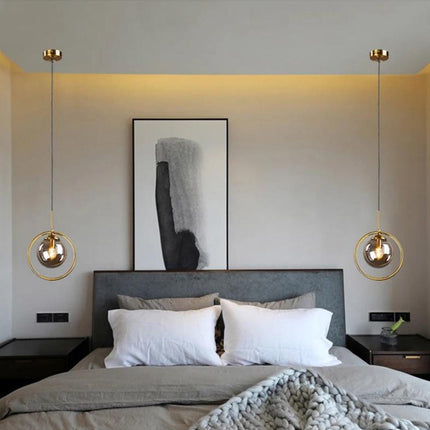 Nordic glass pendant light with golden ring, smoked grey tint