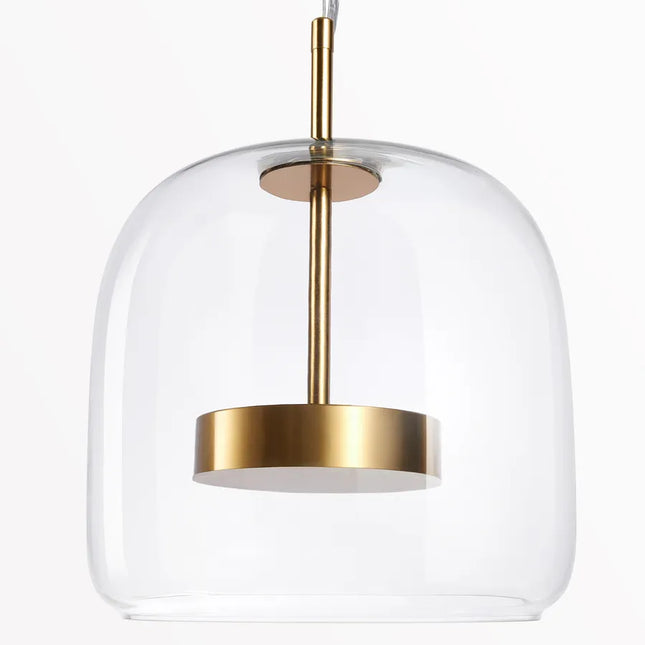 Abat-jour en verre transparent de la suspension, disque et tige en laiton doré visibles à l'intérieur